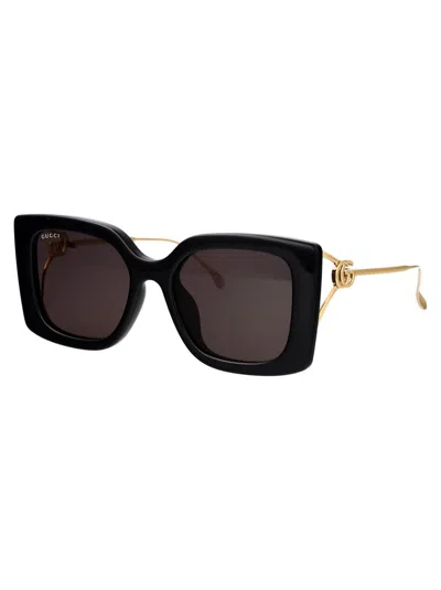 Shop Gucci Sunglasses In 001 Black Gold Grey