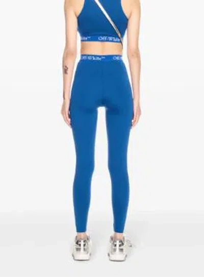 Shop Off-white Trousers In Blue