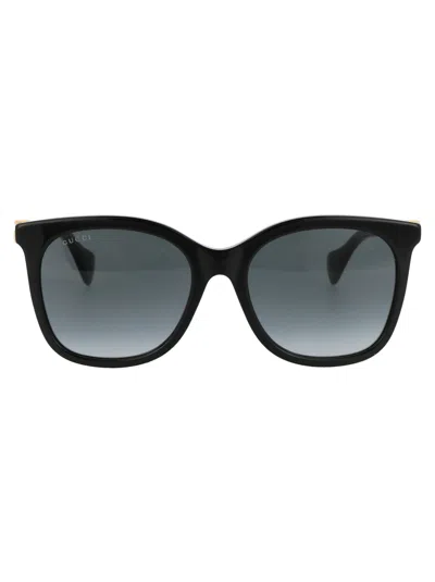 Shop Gucci Sunglasses Gg1071 S 001