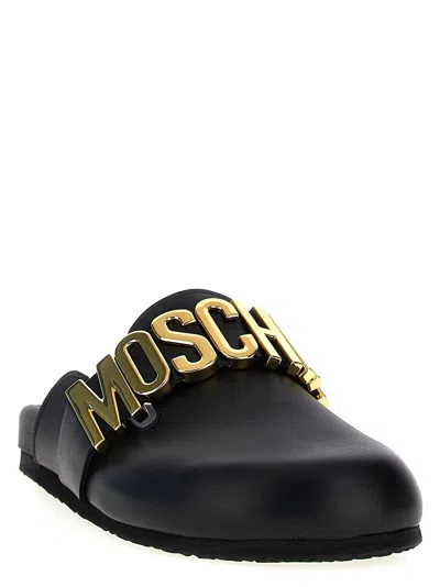 Shop Moschino 'birky' Sabots