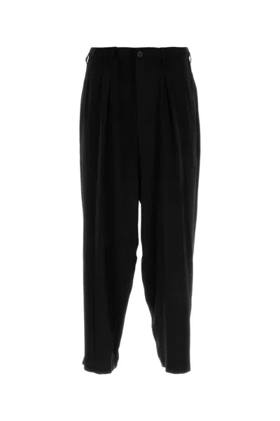 Shop Yohji Yamamoto Pants In Black