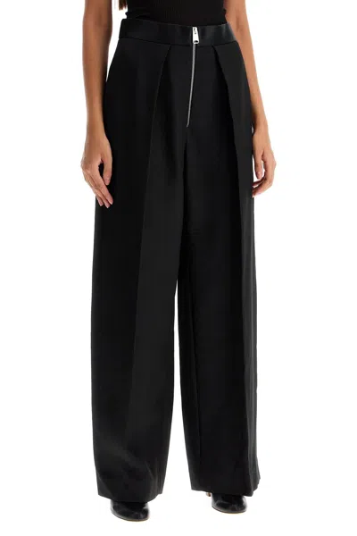 Shop Khaite Marine Pleated Pants With