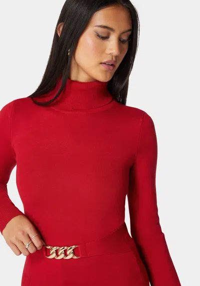 Bebe Fitted Turtle Neck Ornate Belt Sweater In Salsa