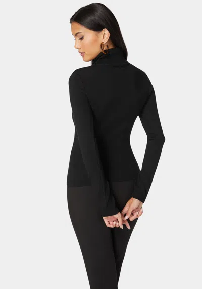 Bebe Fitted Turtle Neck Ornate Belt Sweater In Black