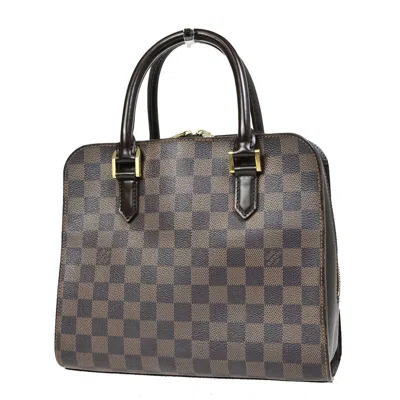 Pre-owned Louis Vuitton Triana Canvas Handbag () In Brown