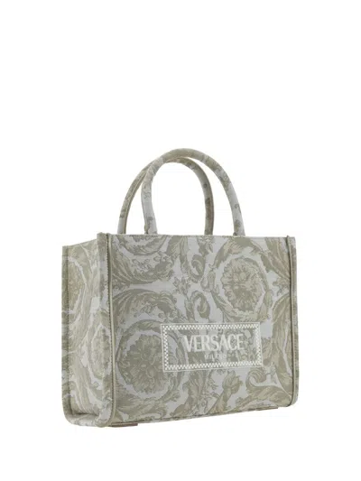 Shop Versace Handbags In Beige