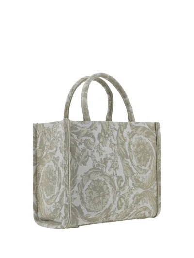 Shop Versace Handbags In Beige