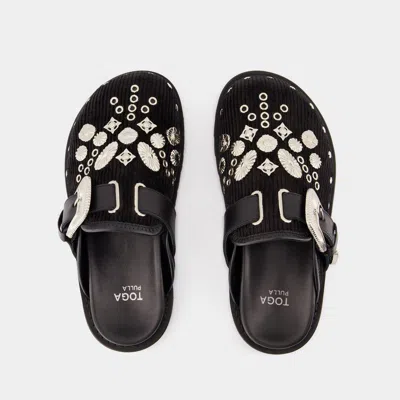 Toga Studded Faux-fur Mules In Black