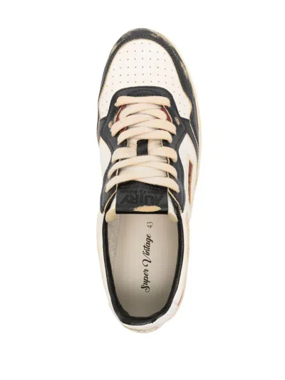 Shop Autry Super Vintage Low Leather Sneakers