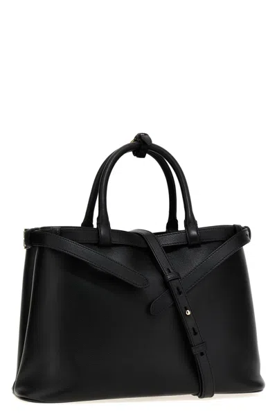Prada Handbags. In Black