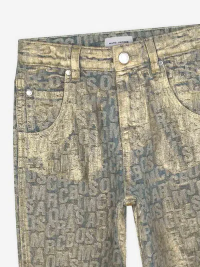 Marc Jacobs All-over Logo Distressed Jeans In Gold