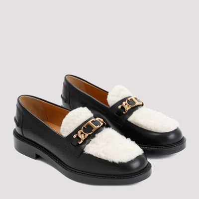 Shop Tod's Loafers In Black