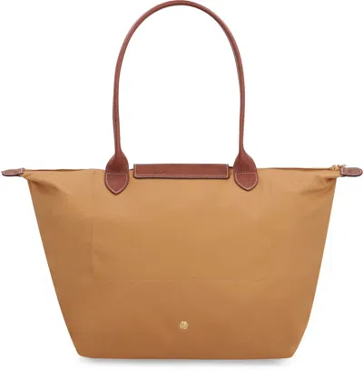 Shop Longchamp Le Pliage Original L Tote Bag In Brown