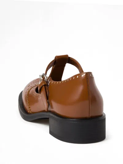Miu Miu T-strap Leather Brogue Shoes In Tabacco+avorio