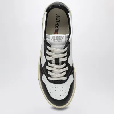 Shop Autry Medalist Sneakers In White/black Leather