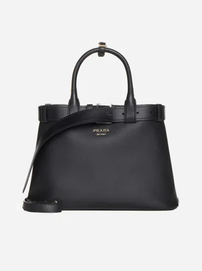 Shop Prada Buckle Leather Medium Tote Bag In Black