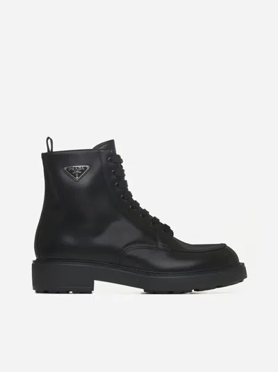 Prada Logo-plaque Panelled Ankle Boots In Black
