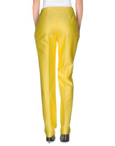 Shop Emanuel Ungaro Casual Pants In Yellow