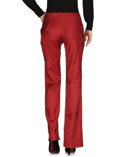 Shop Versace Casual Pants In Maroon