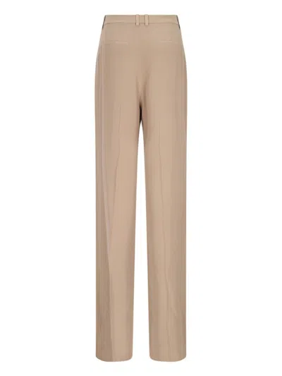 Shop Saint Laurent Trousers In Beige