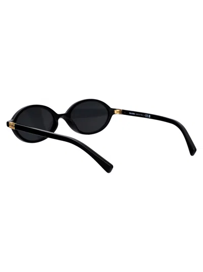 Miu Miu Logo Round Sunglasses In Black