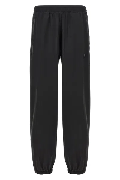 Givenchy Logo Elastic Waistband Pants With Pockets In Black