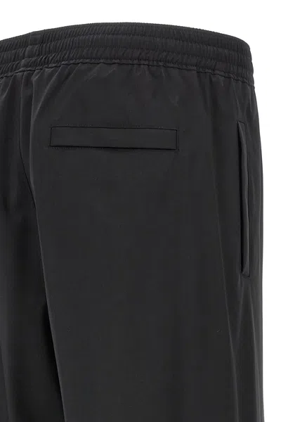 Givenchy Logo Elastic Waistband Pants With Pockets In Black