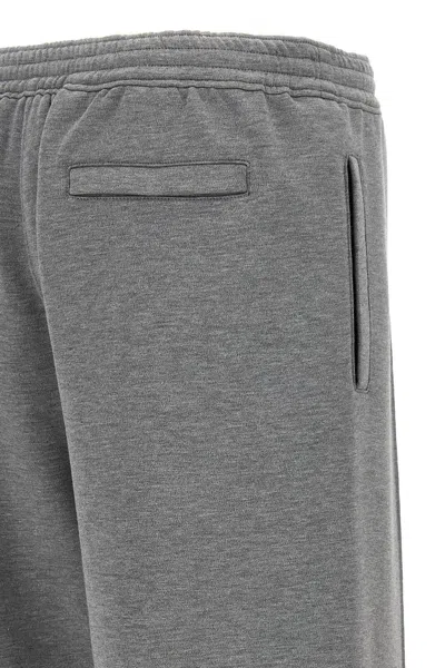 Givenchy Metallic Logo Joggers In Gray