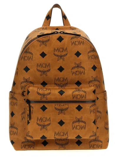 Shop Mcm Stark Medium Backpacks In Brown