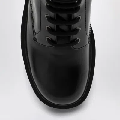 Prada Brushed Leather Ankle Boot For Men In Black