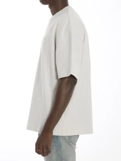 Amiri Oversized Short-sleeved Crewneck T-shirt In Beige