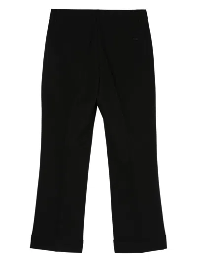 Shop Seventy Trousers In Black