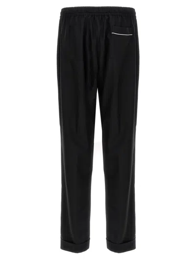 Dolce & Gabbana Elastic Waistband Cuffed Hem Trousers In Black