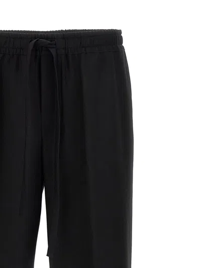 Dolce & Gabbana Elastic Waistband Cuffed Hem Trousers In Black