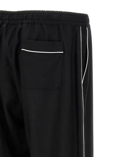 Dolce & Gabbana Elastic Waistband Cuffed Hem Trousers In Black