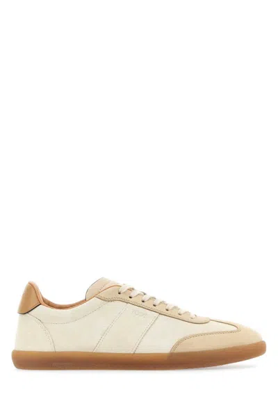 Shop Tod's Sneakers In White