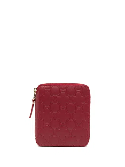 Shop Comme Des Garçons Embossed-finish Zipped Leather Wallet In 红色