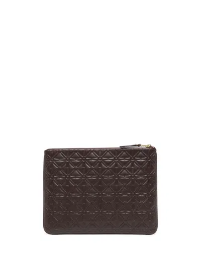 Comme Des Garçons Logo-stamp Embossed Leather Wallet In 褐色