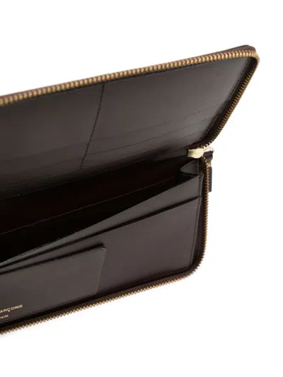Comme Des Garçons Monogram-pattern Leather Wallet In 褐色