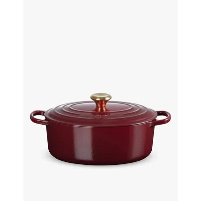 Le Creuset Rhone Signature Oval Cast-iron Casserole Dish In Garnet