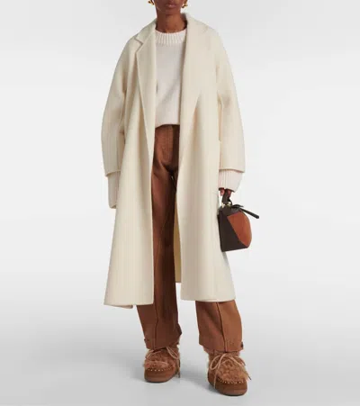 Inuikii Long Curly Shearling Boots In Brown