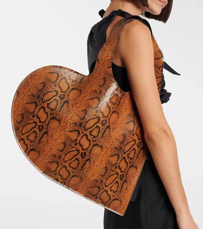 Coperni Heart Sneakeskin-effect Shoulder Bag In Brown