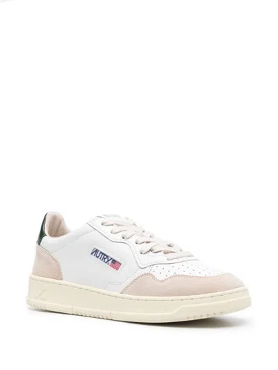 Shop Autry Sneakers In White