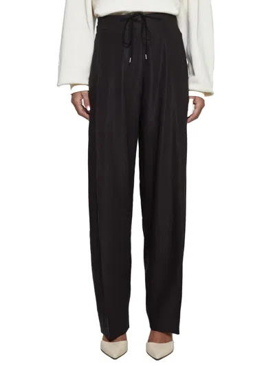 Shop Studio Nicholson Trousers In Brown