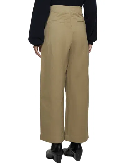 Shop Studio Nicholson Trousers In Brown