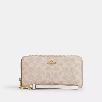 Coach Long Zip Around Wallet In Signature Canvas In Beige