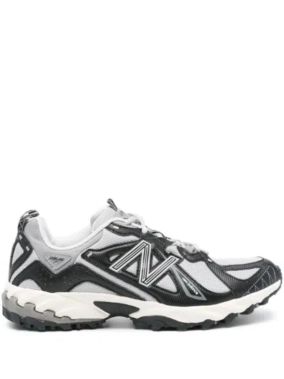 Shop New Balance ml 610 Sneakers In Black