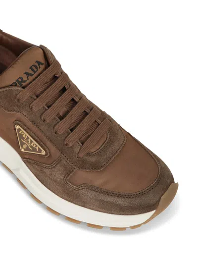 Shop Prada Sneakers In Brown