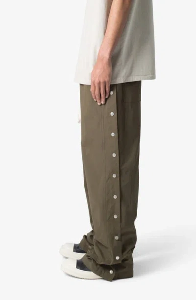 Shop Mnml Side Snap Nylon Pants In Olive