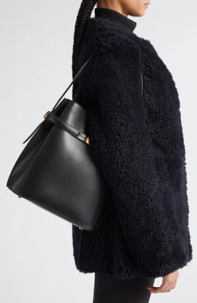 Totême Belted Palmellata Leather Bucket Bag In Black